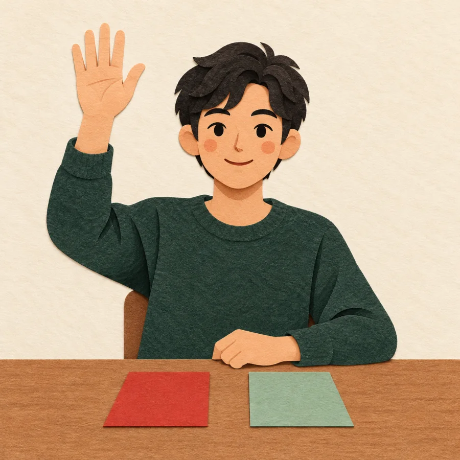 A person raises a hand above two choice cards on a table.