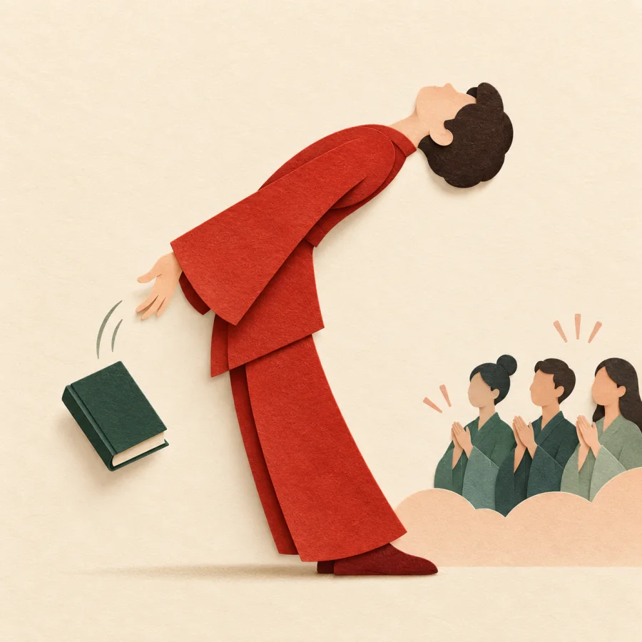 A person in red bows deeply, dropping a green book behind them