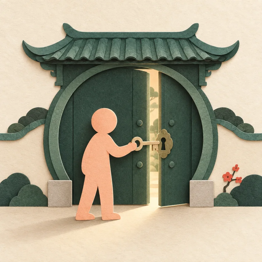 A person before a locked gate