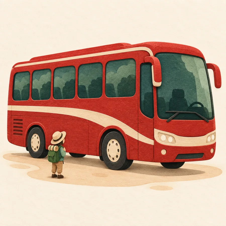 Un grand autocar à côté d'un voyageur