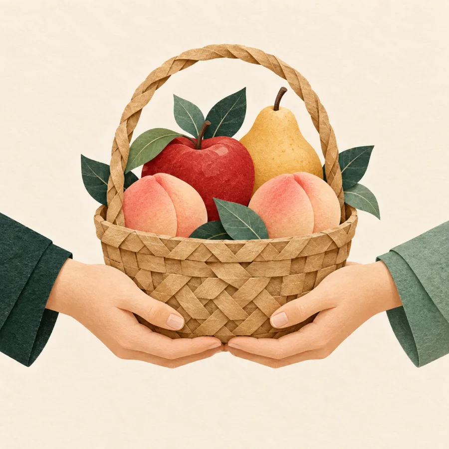 Des mains se partageant un panier de fruits