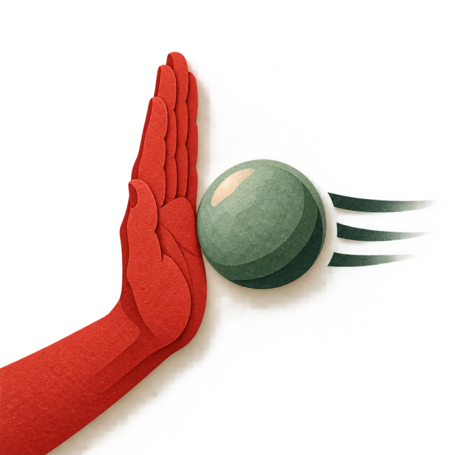 A hand stopping a moving ball