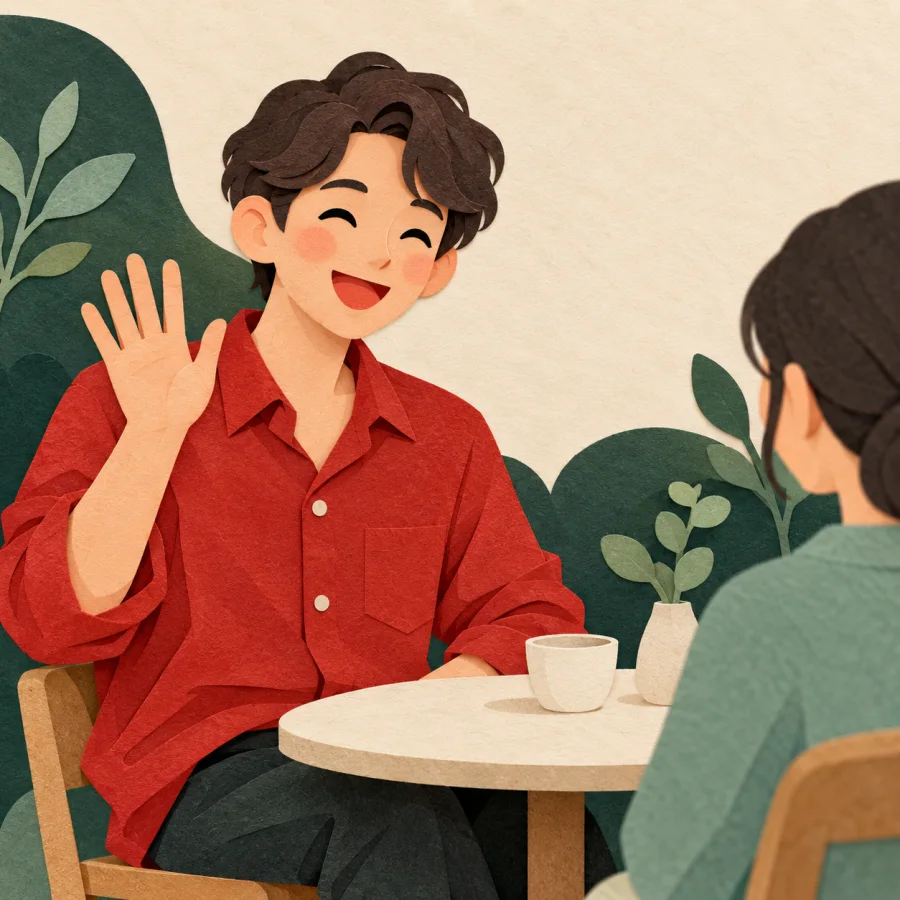 A smiling person waves, turned toward another across a table