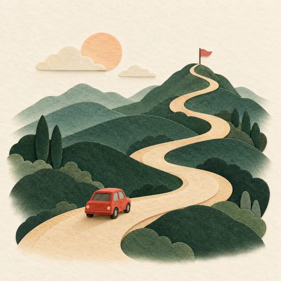 A car drives a winding road toward a distant flag
