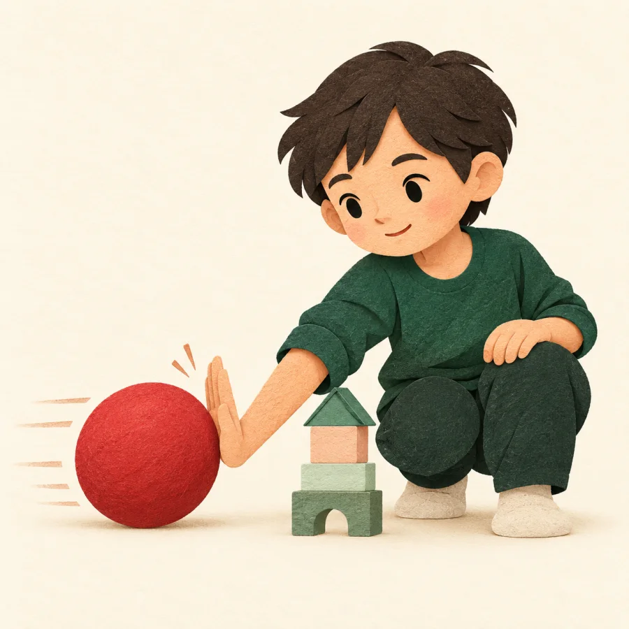 A person stops a rolling ball with a palm before a block tower