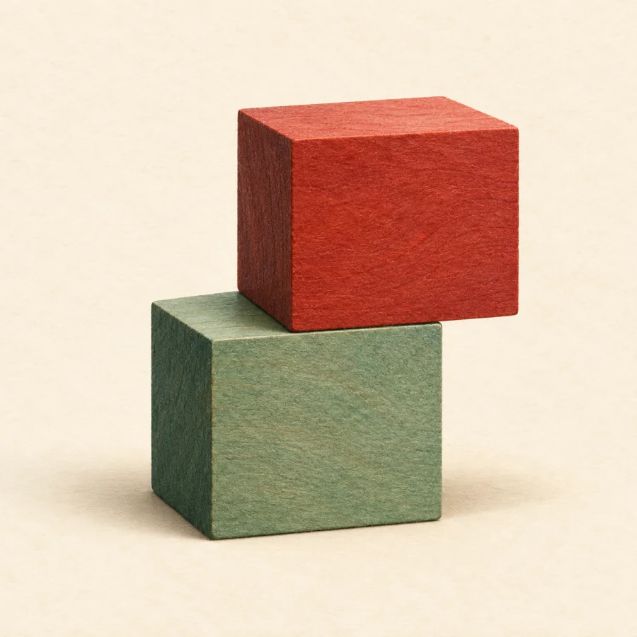 The top block is shifted sideways off the bottom one