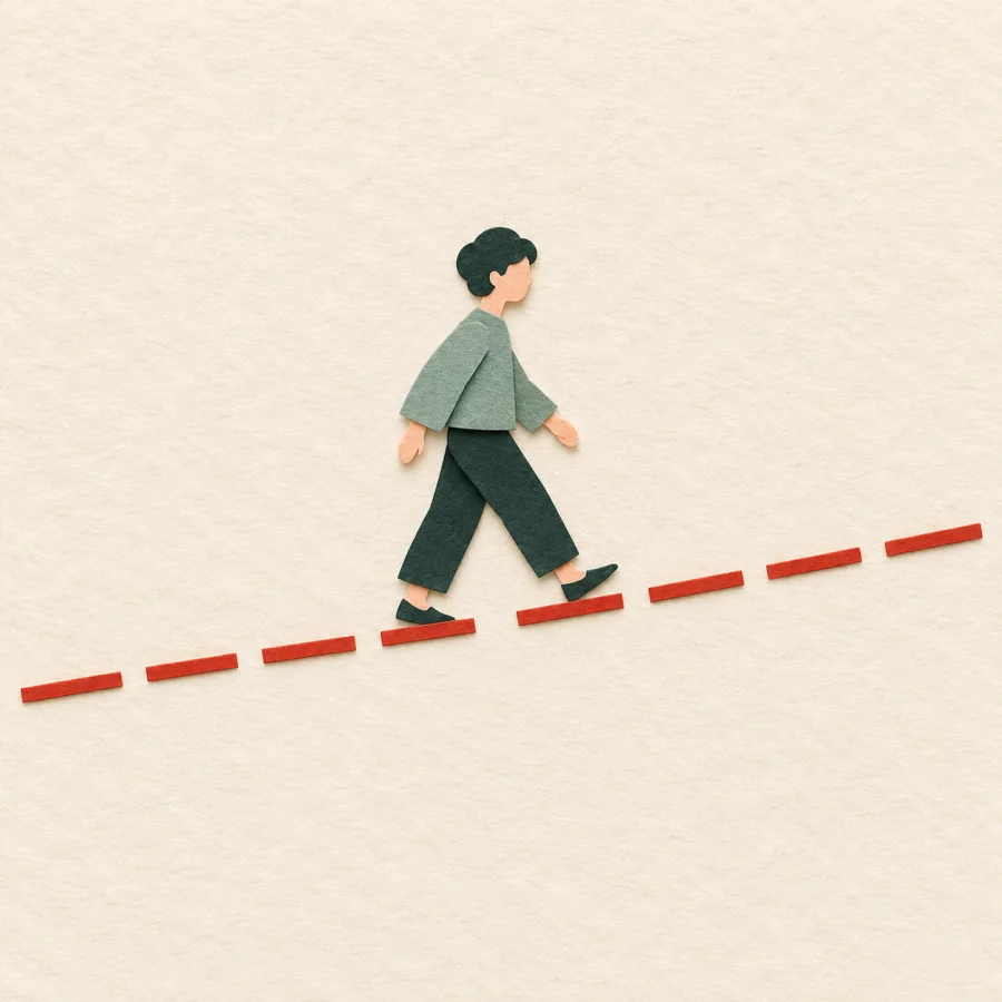 A broken red line in pieces with a person following it