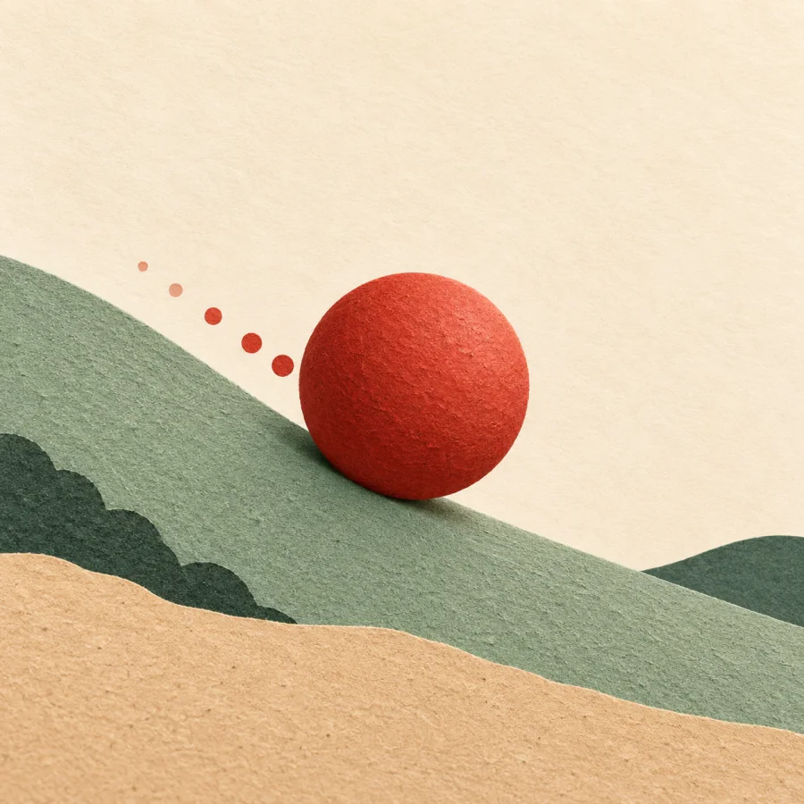 A ball rolls down a gentle slope