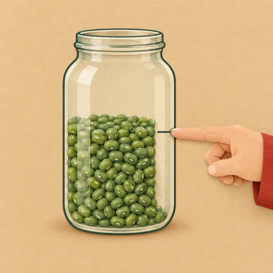 A jar filled past the halfway mark with a hand pointing