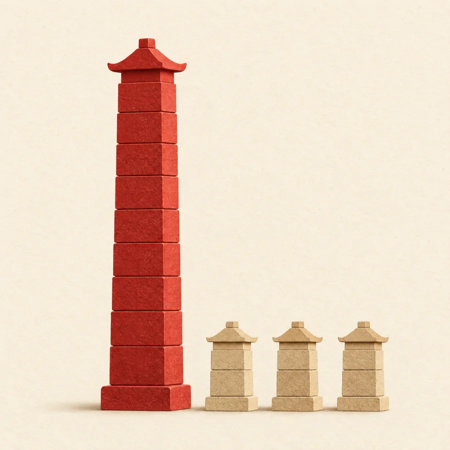 A tall red tower of blocks beside much smaller ones