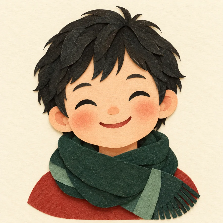A smiling child with rosy cheeks in a green scarf