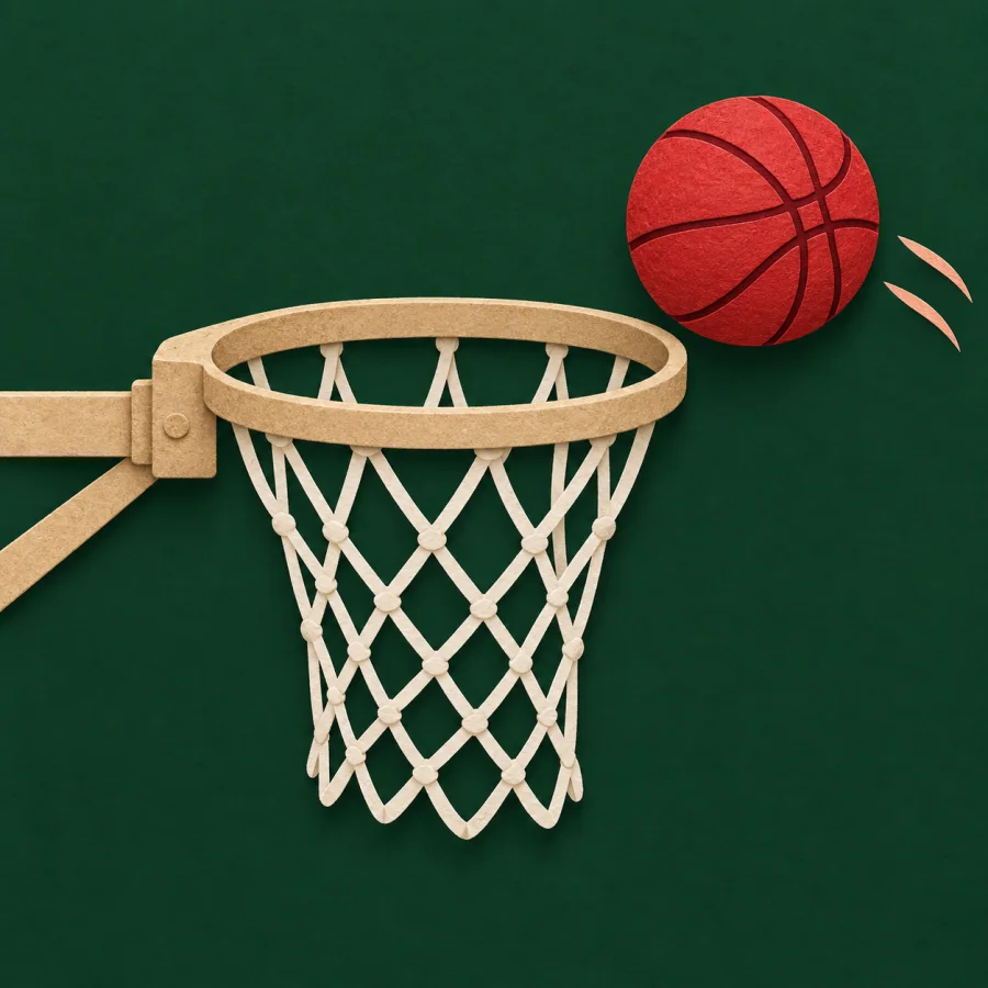 A red ball flies just past the side of a hoop