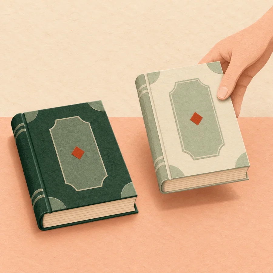A hand lifts a copied book next to its original
