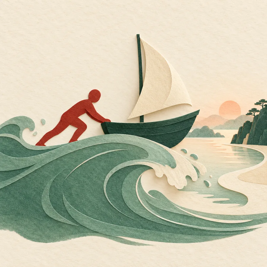 A person helps a wave carry a small sailboat toward the harbor