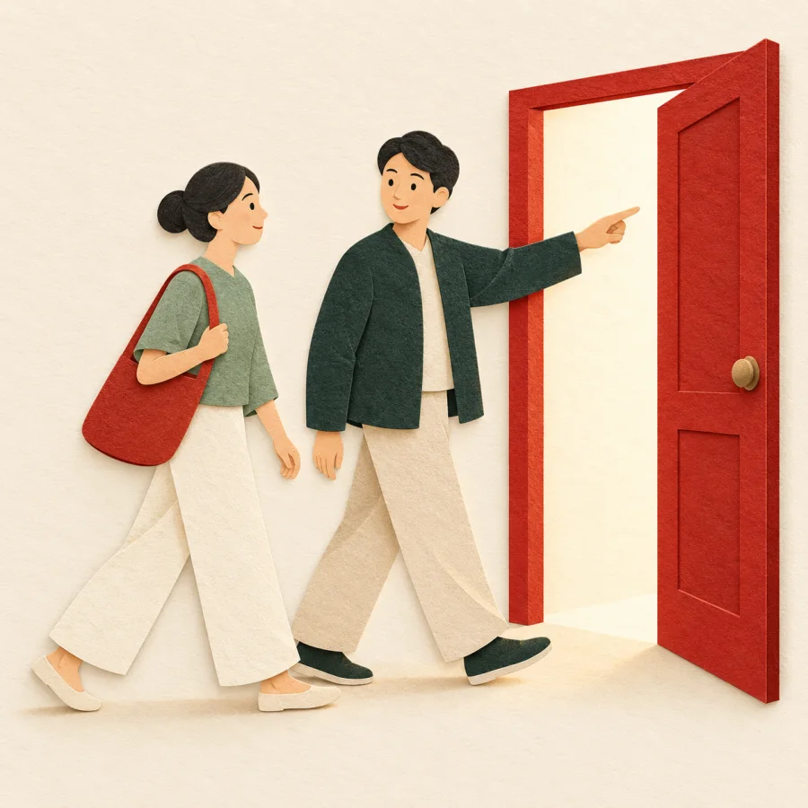 A calm person follows a guide pointing to an open doorway