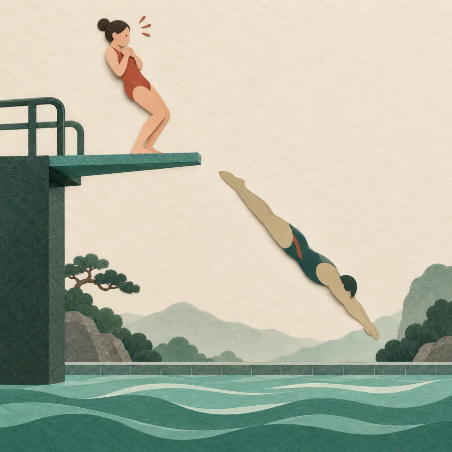 A hesitant swimmer stands at the edge of a diving board while another dives